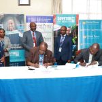 Dr. Laban Ayiro, Vice Chancellor, Daystar University and Mr. Daniel Juma Omondi, Executive Director, Global Peace Foundation Kenya During the MOU Signing at Daystar University