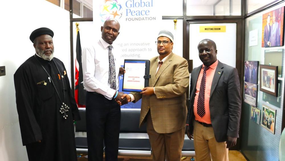 Rev. Fr. Joseph Mutie, Chairman, Interreligious Council of Kenya with the Global Peace Foundation Kenya Team During the MoU Signing Ceremony