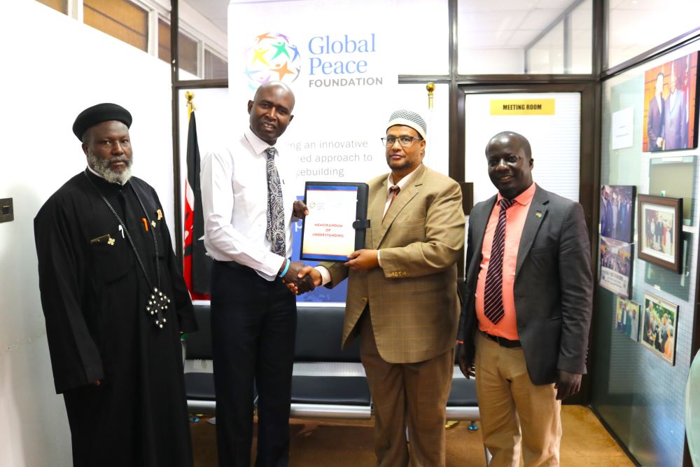 Rev. Fr. Joseph Mutie, Chairman, Interreligious Council of Kenya with the Global Peace Foundation Kenya Team During the MoU Signing Ceremony